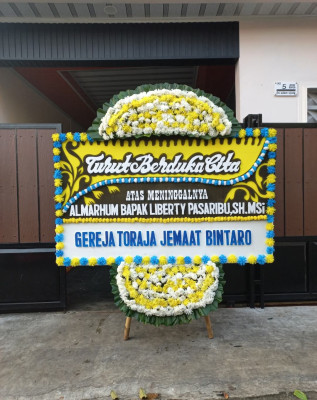 Papan Bunga Duka di Muara Batu
