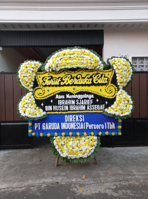 Papan Bunga Duka di Muara Batu