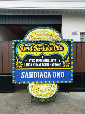Papan Bunga Duka di Muara Batu