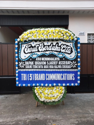 Papan Bunga Duka di Muara Batu